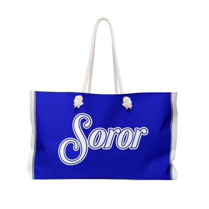Blue bag with 'Soror' text on a white background